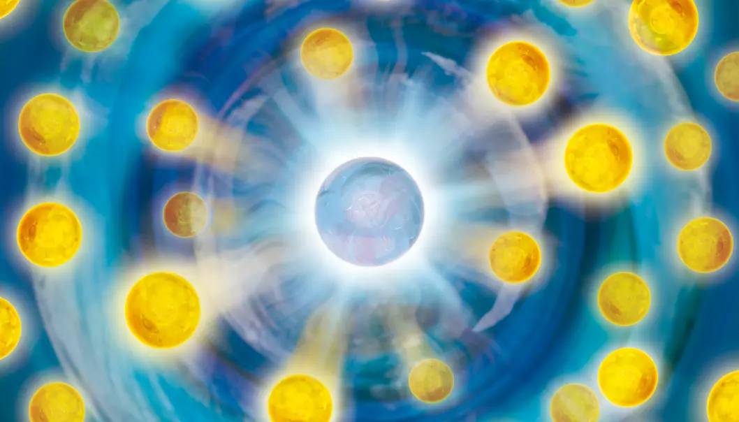 An artistic representation of a ‘polaron’ – a new quantum state, or a ‘quasiparticle’. The potassium atom in the middle (blue) repels the smaller lithium atoms (yellow). This creates a complex state, which physically can be best described as a quasiparticle (Illustration: Harald Ritsch)
