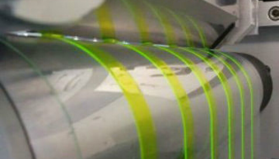 Scientists have come up with a method for creating light-emitting surfaces using method that’s similar to the one used for printing newspapers. The picture shows flexible light sheets fabricated using the so-called roll-to-roll coating method. (Photo: Ludvig Edman)