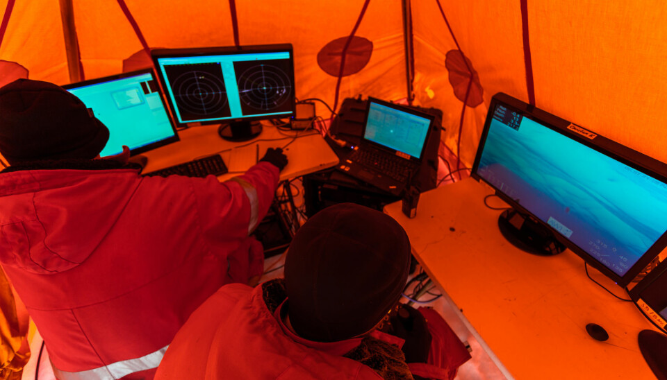 The researchers studying the Arctic Ocean inside their warm tent. (Photo: Stefan Hendricks, Alfred Wegener Institute)
