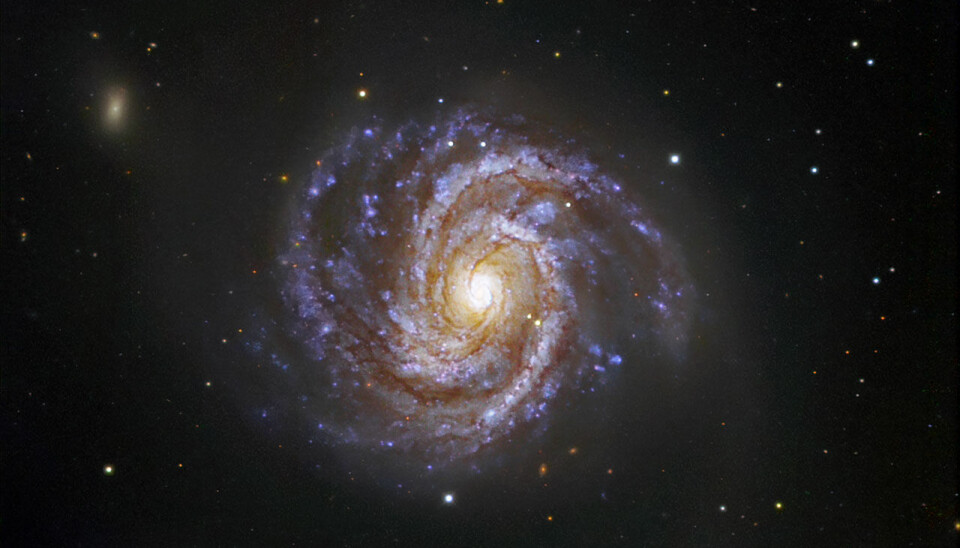 The Messier 100 bears many similarities to our own Milky Way – a large spiral galacy with a bright core and two prominent ‘arms’. (Source: ESO/IDA/Danish 1.5 m/R. Gendler, J.-E. Ovaldsen, C. C. Thöne and C. Féron)