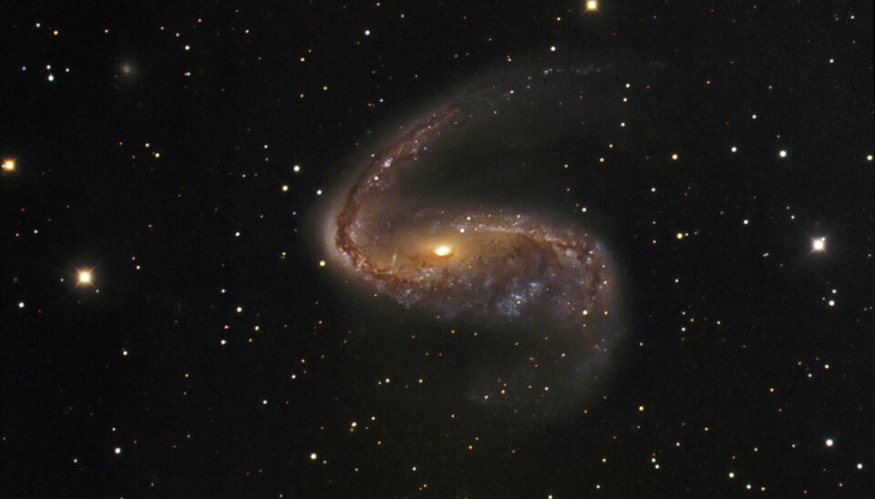 This twisted galaxy is known as the NGC 2442, but is better known by its popular name, the Meathook Galaxy, due to its peculiar shape. It is located 50 million light years from Earth in the Volans constellation in the southern sky. (Source: ESO/IDA/Danish 1.5 m/R. Gendler, J.-E. Ovaldsen, C. C. Thöne and C. Féron)