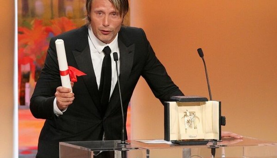 Cannes 2012: Mads Mikkelsen accepts the award for best actor in a leading role for his role in Thomas Vinterberg’s ‘The Hunt’. (Photo: Colourbox)