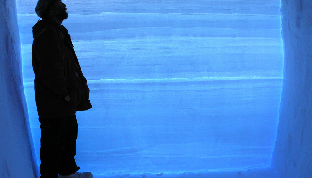 A researcher standing next to an ice core extracted from the West Antarctic Ice Sheet. Each of the horizontal lines represents one year’s worth of snowfall. The ice core contains detailed climate data from the past 68,000-years. (Photo: Kendrick Taylor/Desert Research Institute) A researcher standing next to an ice core extracted from the West Antarctic Ice Sheet. Each of the horizontal lines represents one year’s worth of snowfall. The ice core contains detailed climate data from the past 68,000-years. (Photo: Kendrick Taylor/Desert Research Institute)