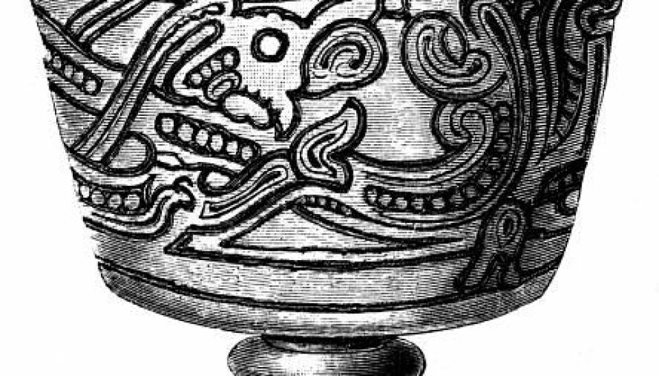 The Jelling style is named after a silver cup found in a tomb in Jelling, Denmark, in 1820. This style is characterised by stylised and band-shaped animal bodies.