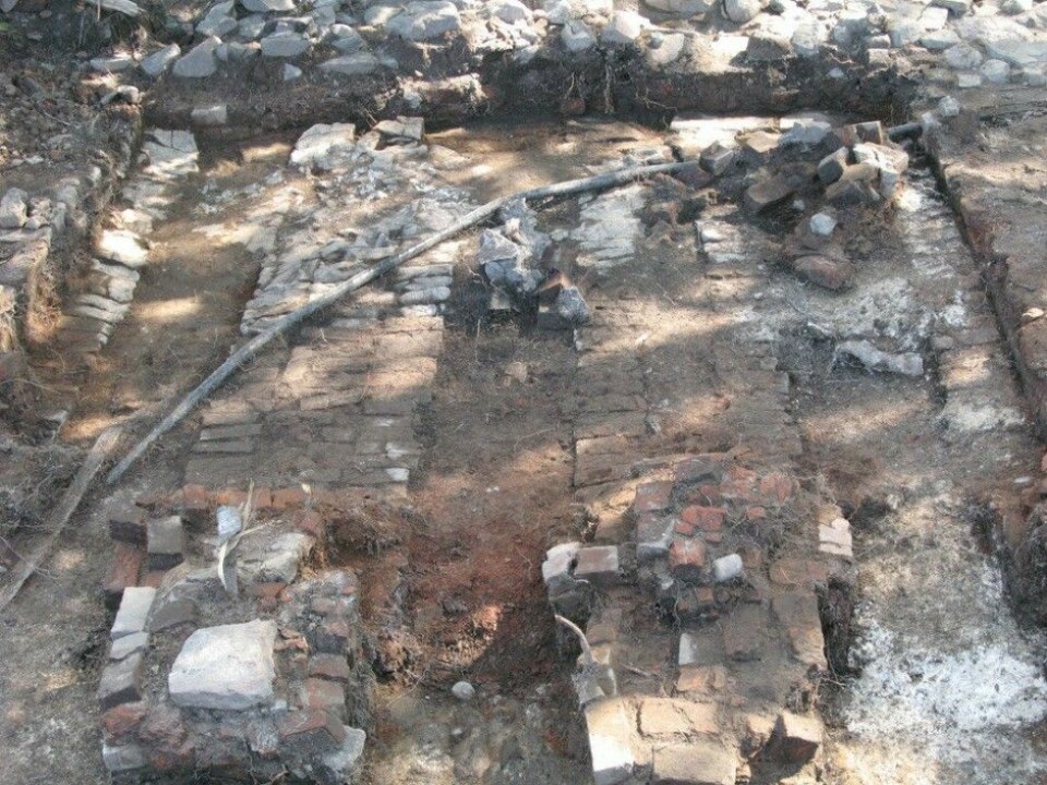 The remnants of a brick kiln where Anna Ihr excavated quantities of vitreous material. It had functioned as insulating material on the exterior of the kiln. (Photo: Anna Ihr)