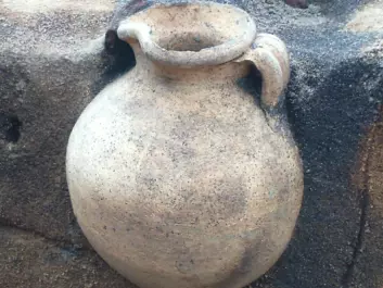 A vessel on top of the jug helped protect it and ensure that it was found intact well over 1,000 years after it was laid in the ground. (Photo: Southwest Jutland Museums)