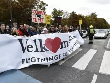 Protesters welcomed refugees in front of the Danish Parliament in Copenhagen on 6 October 2015. The demonstration was directed against the Danish government, which had further tightened Danish immigration policy. But many Danes support this policy. (Photo: Søren Bidstrup / EPA / NTB)