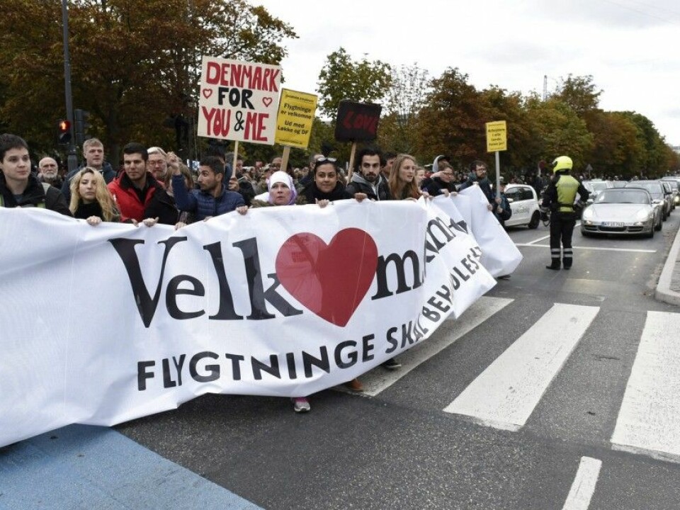 Protesters welcomed refugees in front of the Danish Parliament in Copenhagen on 6 October 2015. The demonstration was directed against the Danish government, which had further tightened Danish immigration policy. But many Danes support this policy. (Photo: Søren Bidstrup / EPA / NTB)