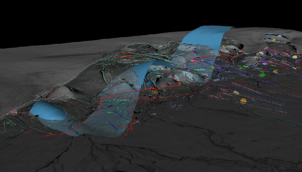 A scene from the geological 3D-model of Kilen. The terrain is made transparent, so you can see a reconstructed, folded, geological surface, shown by the blue colour. The coloured lines indicate the mapped geological layers and faults. The scene is approximately 10 by 10 kilometres (Photo: Kristian Svennevig)