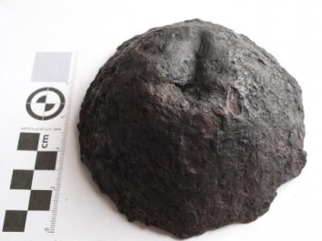 Archaeologists have struggled to explain the dents in shield bosses like this one. (Photo: Rolf Warming) Archaeologists have struggled to explain the dents in shield bosses like this one. (Photo: Rolf Warming)