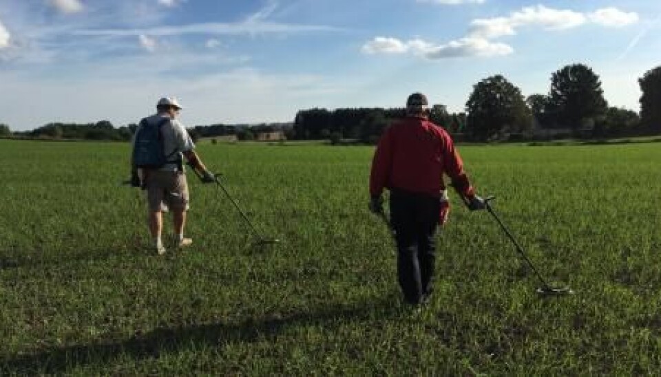Amateur archaeologists, Ole Harpøth (left) and Freddy Arnsten (right) on the hunt in North Zealand, Denmark. (Photo: Mikkel Andreas Beck)