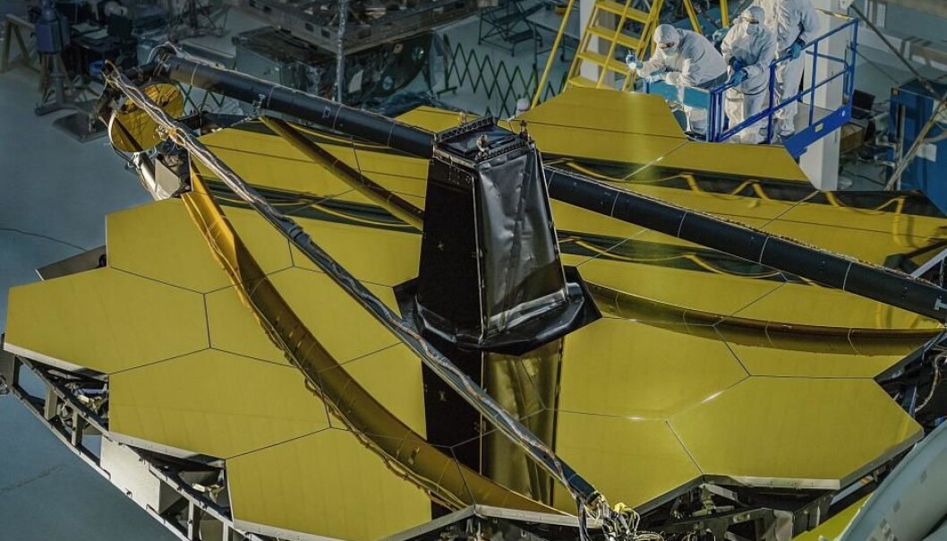 Light from the furthest star is in the infra-red part of the spectrum. The space telescope mirror is covered in gold to reflect infra-red light. (Photo: NASA/C. Gunn) Light from the furthest star is in the infra-red part of the spectrum. The space telescope mirror is covered in gold to reflect infra-red light. (Photo: NASA/C. Gunn)