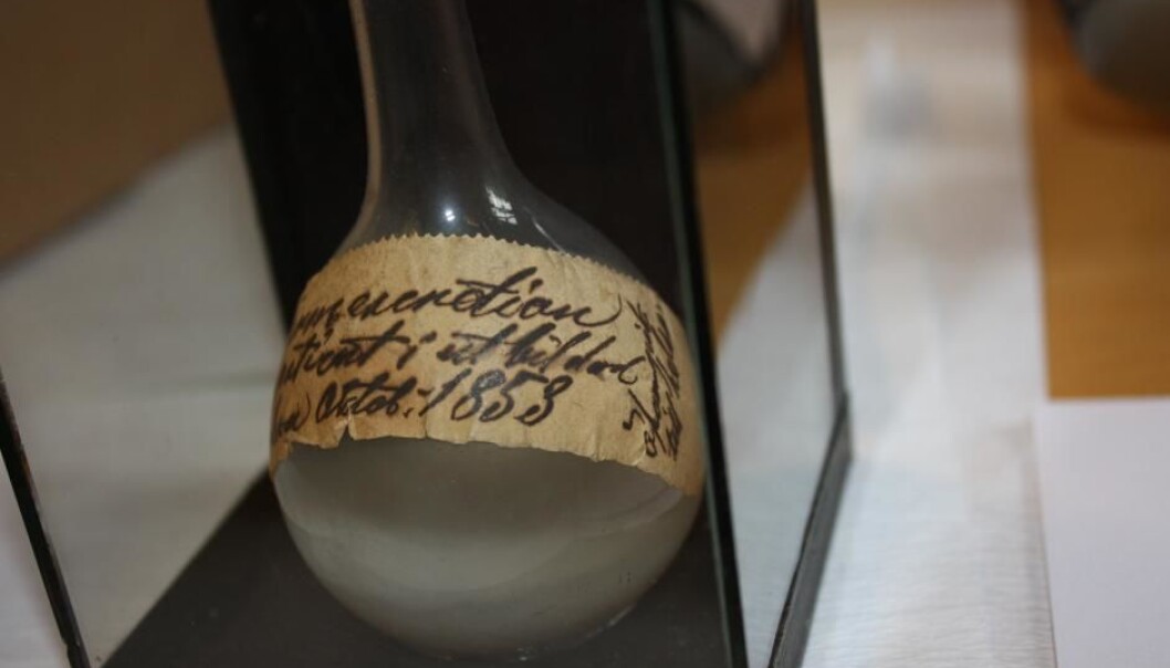 In the bottom of the flask lies intestine water from one of the last cholera patients of the epidemic that hit Copenhagen in 1853. The flask is stored at the Medical Museion in Copenhagen. (Photo: Medical Museion). In the bottom of the flask lies intestine water from one of the last cholera patients of the epidemic that hit Copenhagen in 1853. The flask is stored at the Medical Museion in Copenhagen. (Photo: Medical Museion).