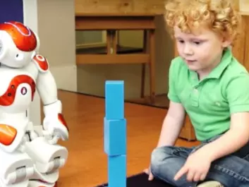 Here Nao the robot helps a toddler learn English in an experiment by researchers at Tilburg University in Germany. A lot of the research on the use of robots looks at possibilities in language teaching. (Photo: Tilburg University)