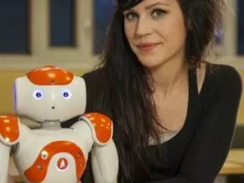 At the University of Gothenburg, Nao the robot has tried out being an educator. He is shown with researcher Sofia Serholt. (Photo: University of Gothenburg)