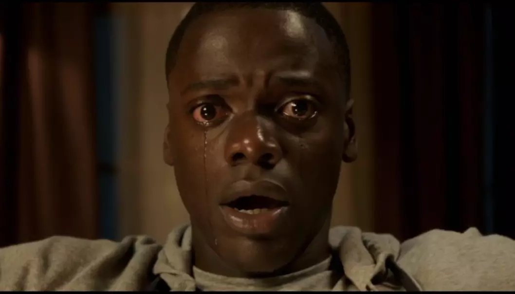When we watch a horror film, we respond to the dangerous and horrifying situations that are being depicted. We identify with the fictional characters who confront terrifying threats. (Photo: Screen capture from the trailer for horror film ‘Get Out’)