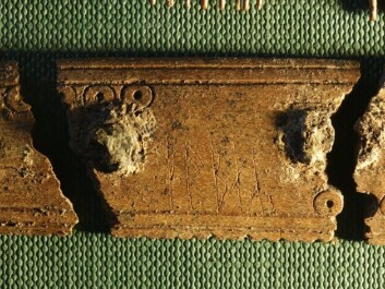 A magnified view of the runes etched on one part of the comb. Both sides contain the word “comb.” On one side it is the verb (to comb) and the other the subject, comb. It was possibly inscribed by two different people. (Photo: Søren Sindbæk) A magnified view of the runes etched on one part of the comb. Both sides contain the word “comb.” On one side it is the verb (to comb) and the other the subject, comb. It was possibly inscribed by two different people. (Photo: Søren Sindbæk)