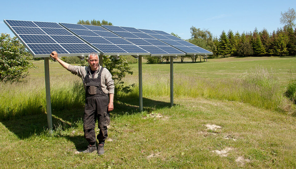 A farmer on the Danish island of Samsø with his solar panels. Samsø is home to a small community of less than 4,000 citizens who managed to switch from fossil fuels to 100 per cent renewable electricity and heat within ten years. (Photo: Samsoe Energy Academy)