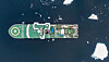 Top-down view of a cargo ship moving through dark sea with ice floes nearby.